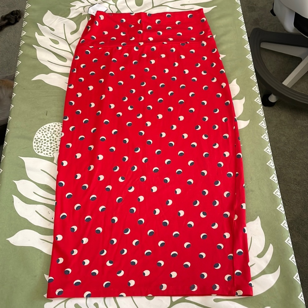 Fighting Eel skirt 95% Modal 5% Spandex. Red with white and black circle print.